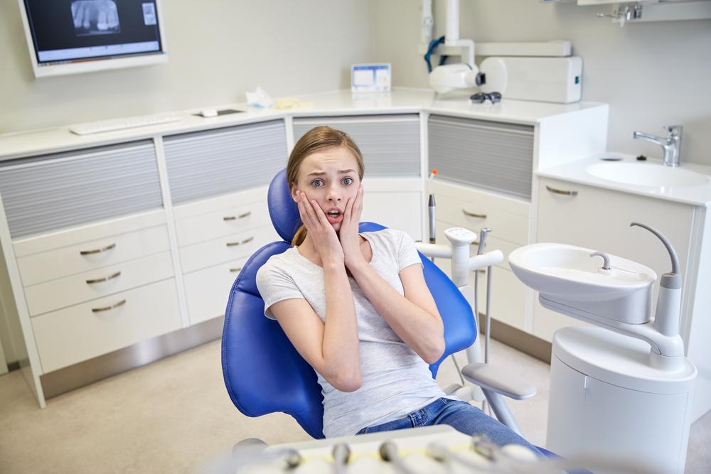 girl worried about the dentist